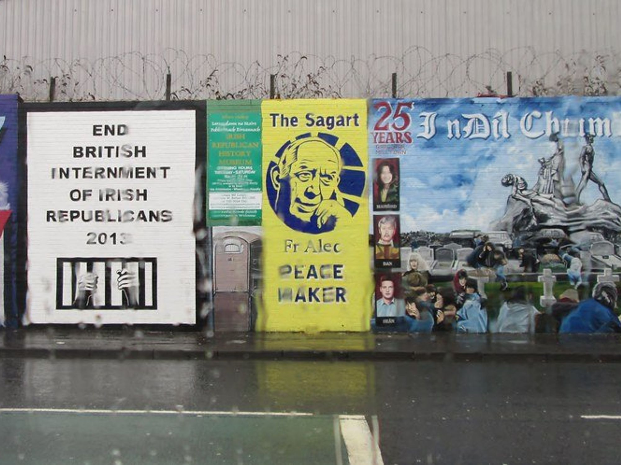 photo of rain and a wall of political signs