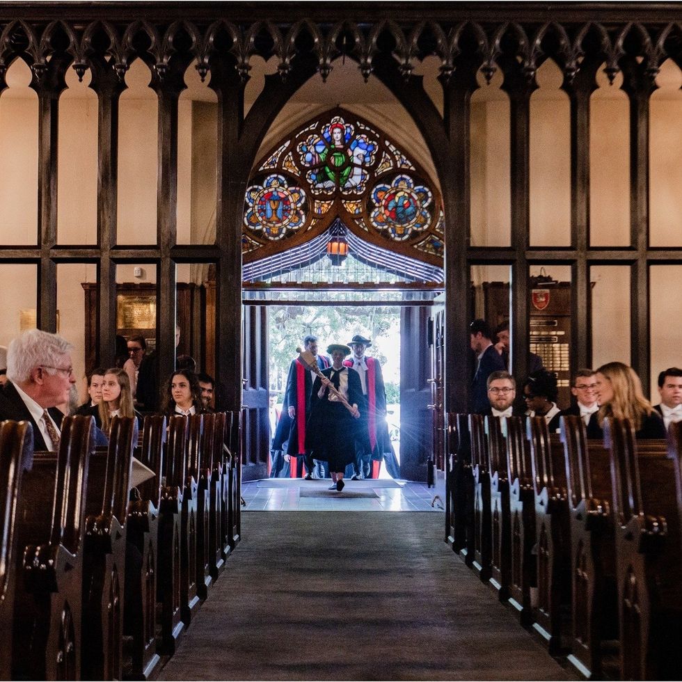 Photo of Ralston College students entering a church-like building in Savannah, Georgia