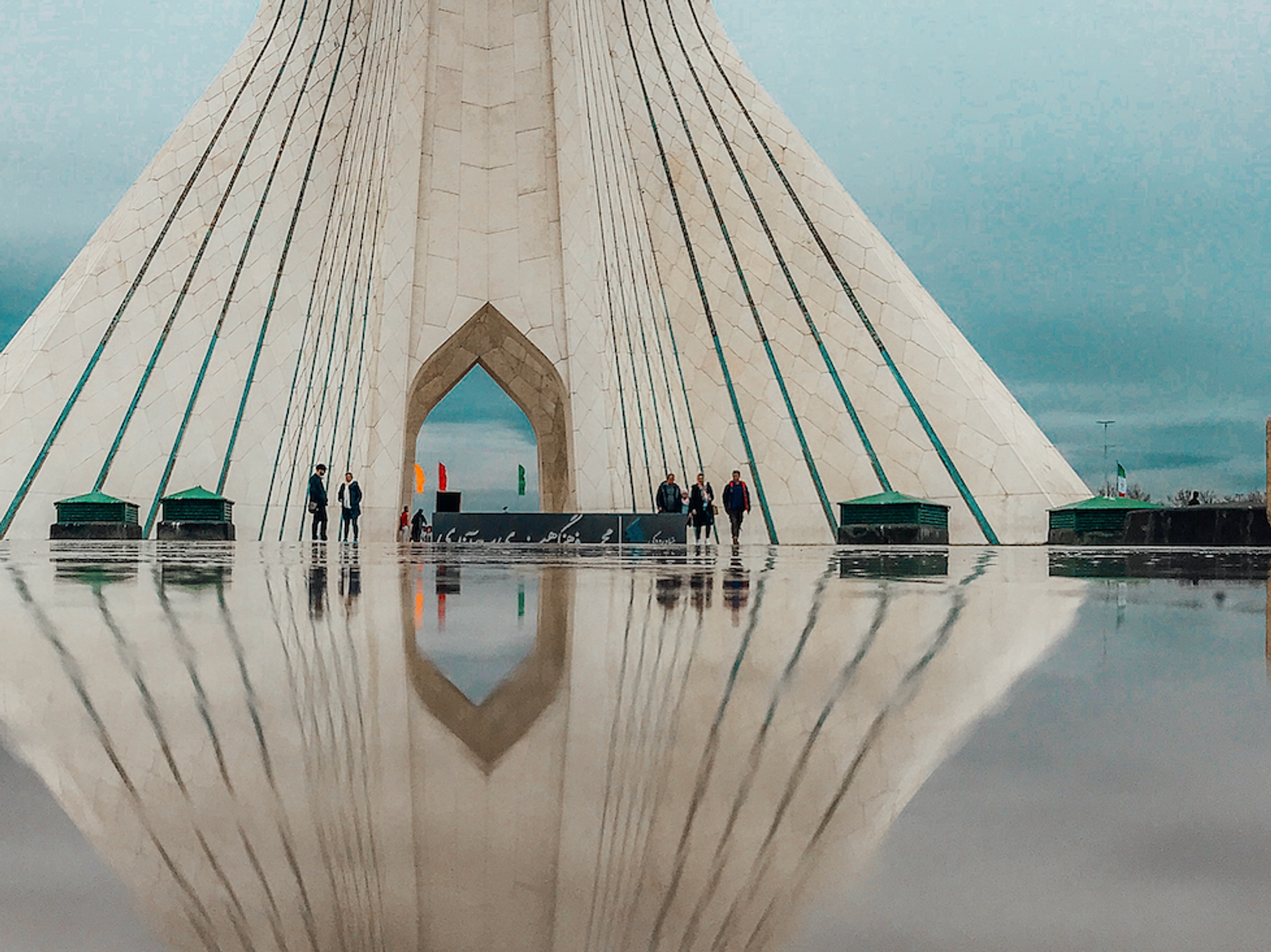 Photo of reflections in front of Tehran's Azadi Tower