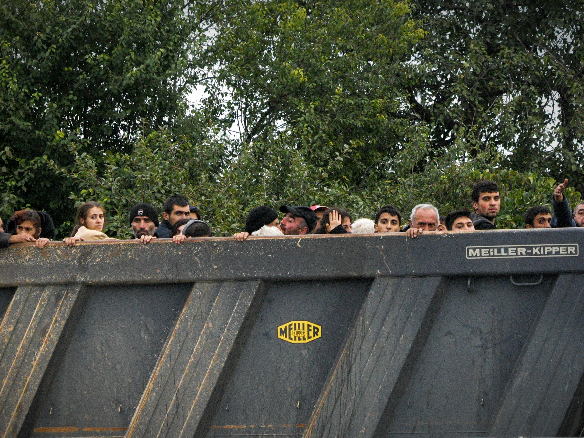 Photo of refugees at the back of a truck arriving from Nagorno-Karabakh to Kornidzor, Armenia on Sept. 26