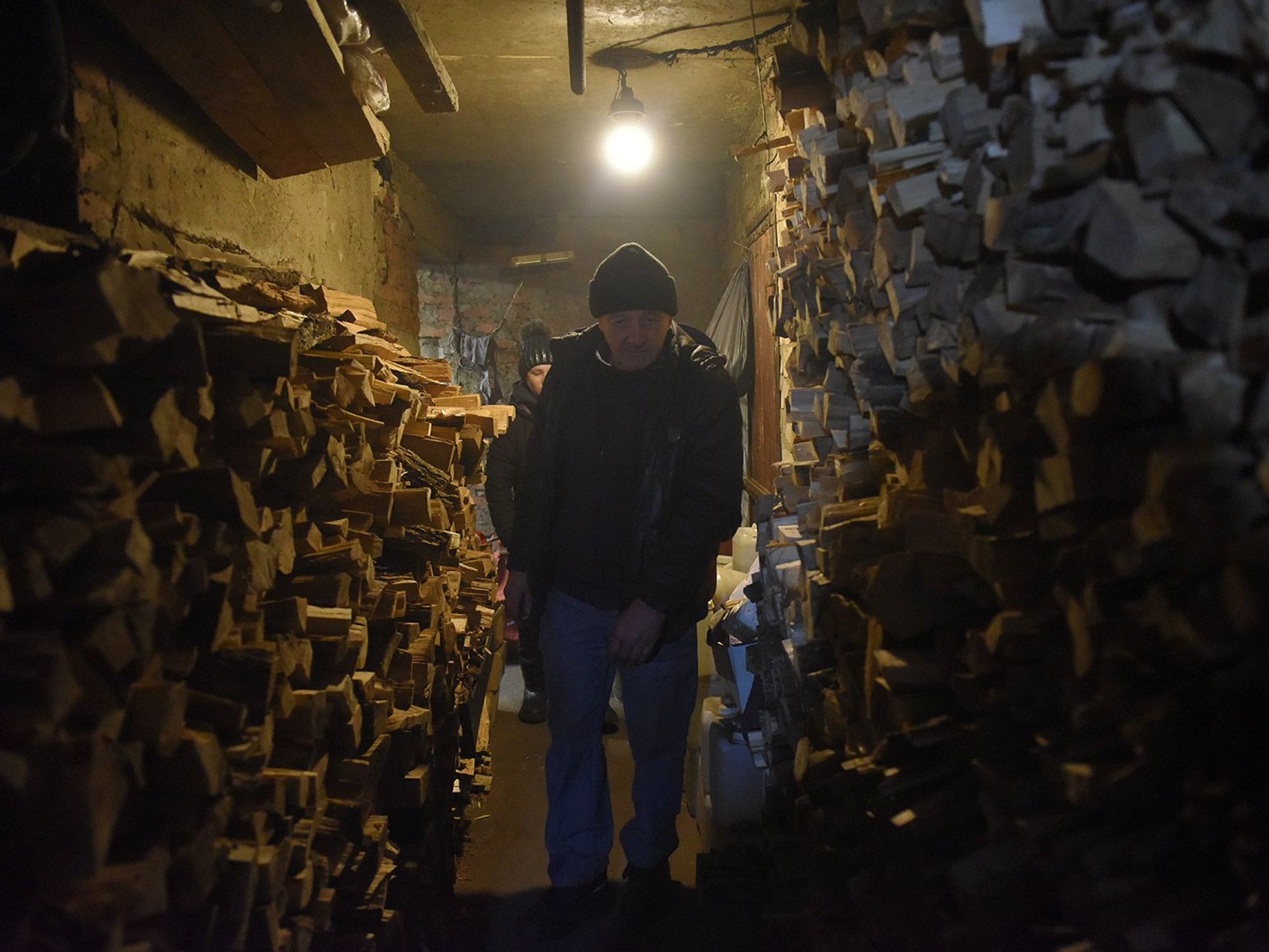 Photo of residents of one of the basements in Lyman who stocked up on firewood