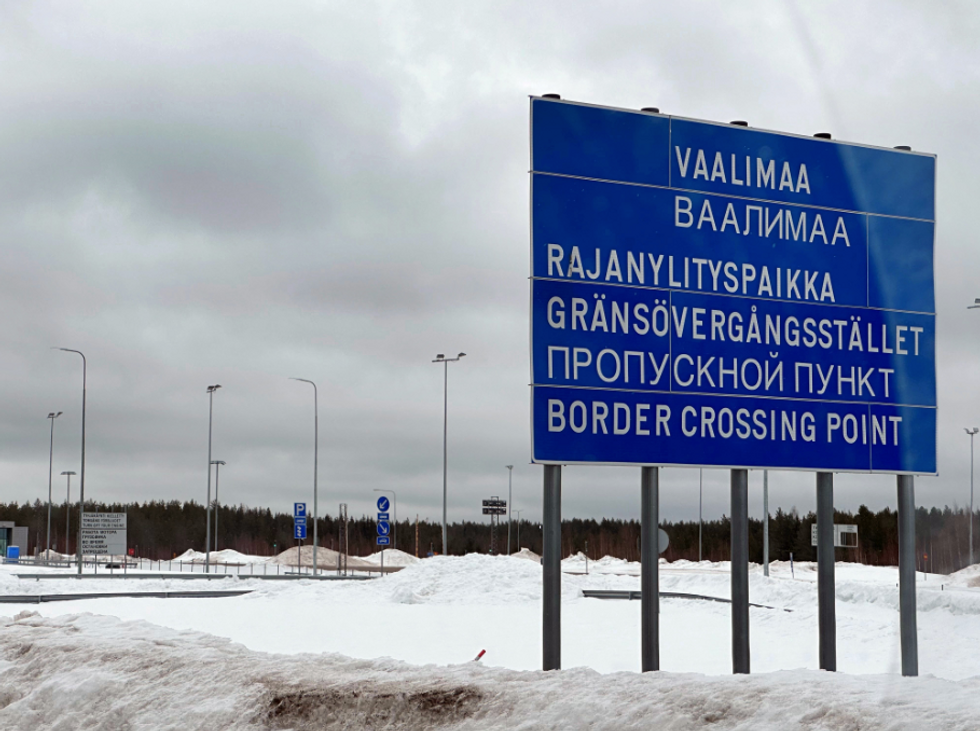 Photo of road signs in at the Finland-Russia border