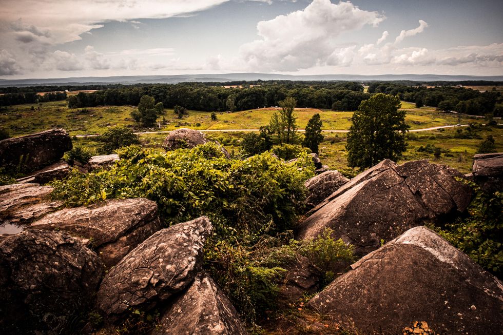 photo of rocks and trees in Gettysburg