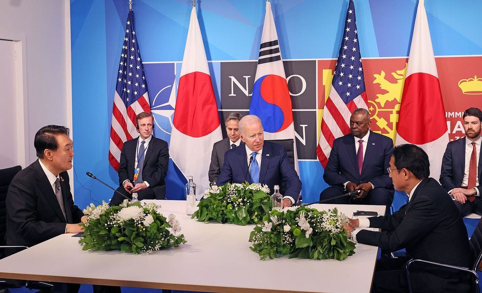 Photo of ROK President Yoon Suk-yeol, US President Biden and Japan Prime Minister Fumio Kishida in a 2022 meeting.
