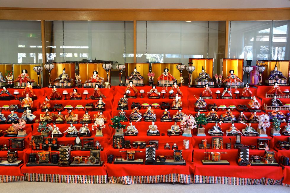 Photo of rows of Hina Ningyo dolls at a sanctuary in Mito, Japan