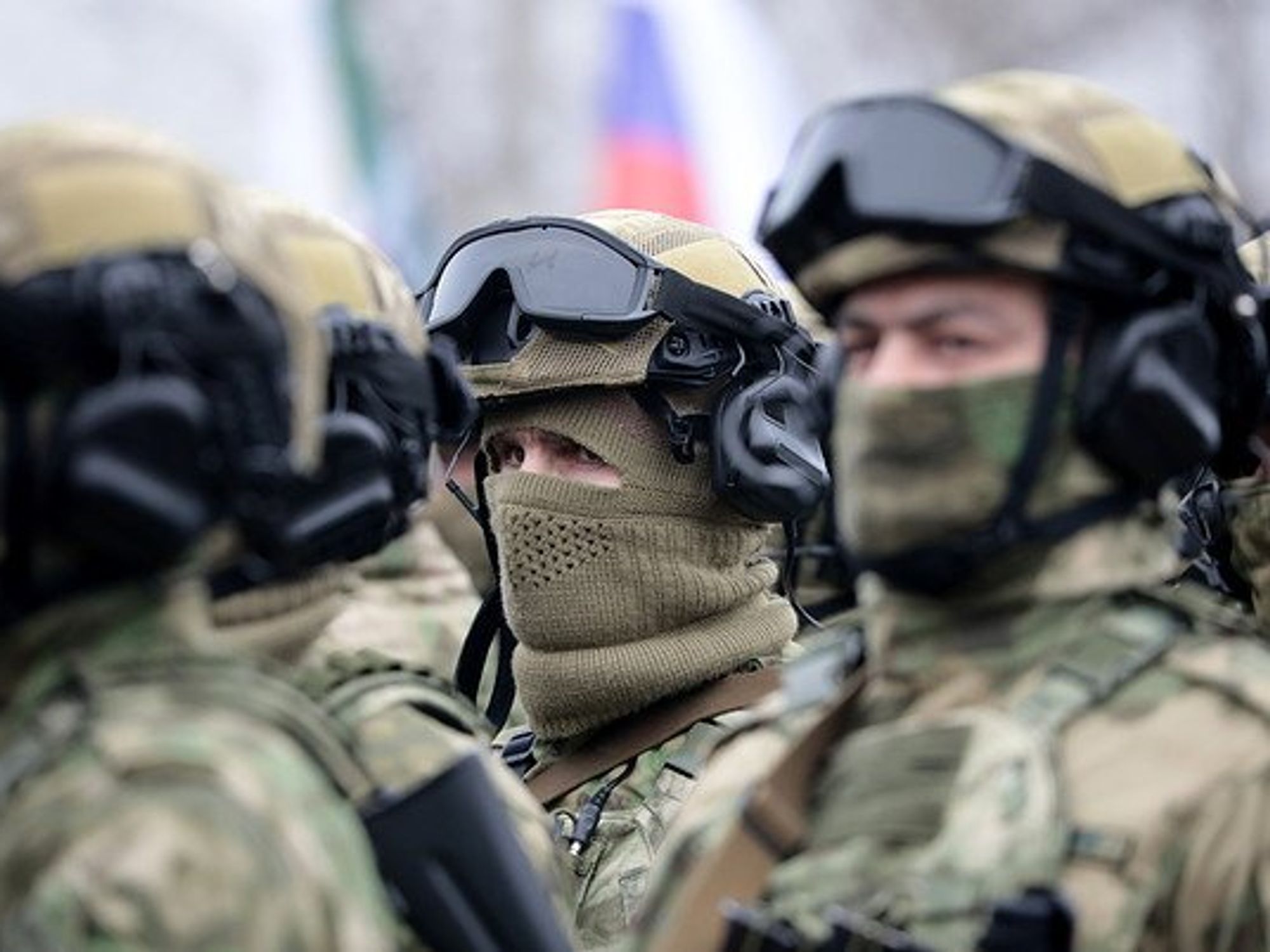 Photo of Russian National Guard officers, with face covered