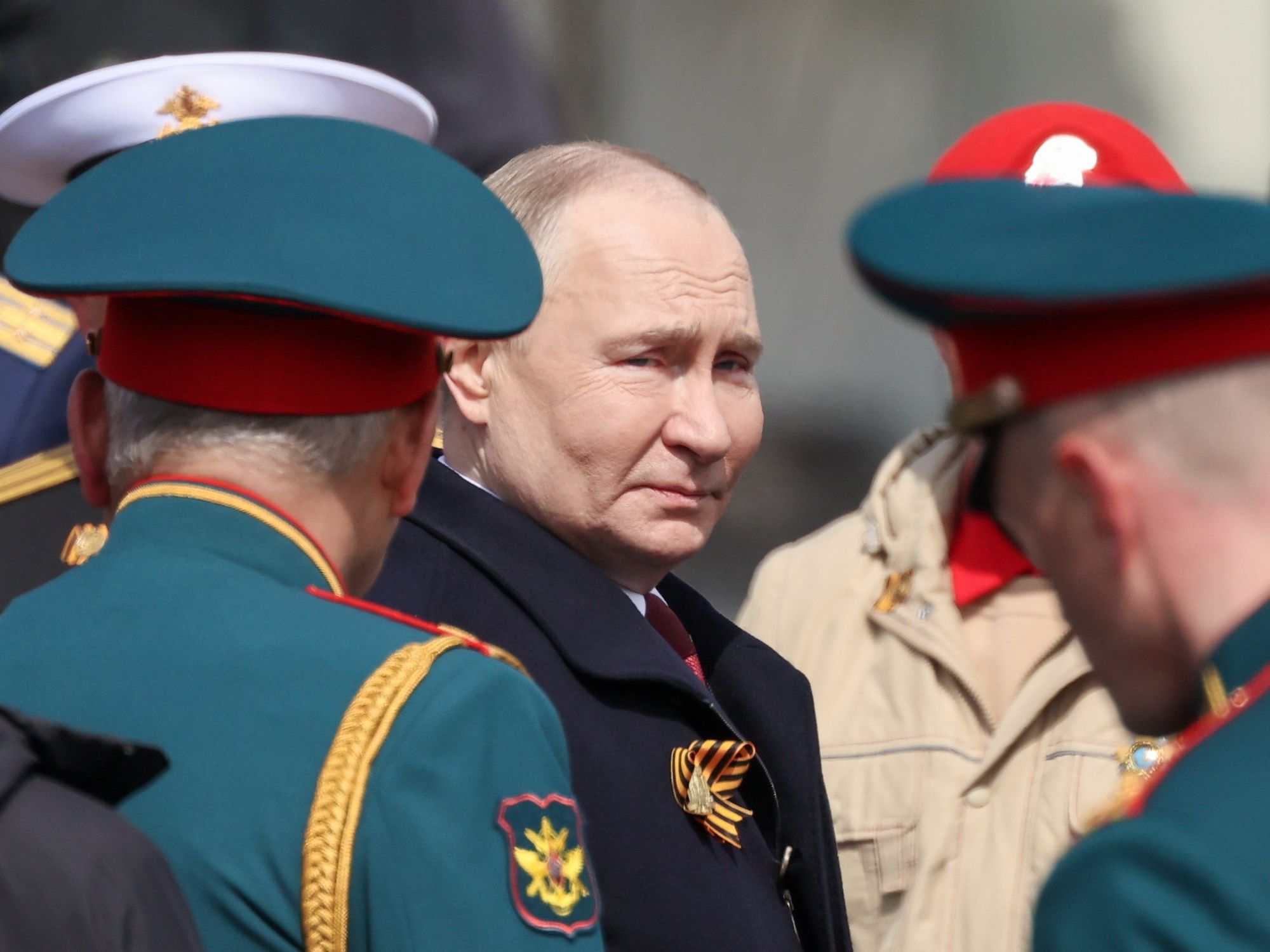 Photo of Russian President Vladimir Putin attending a military parade in Moscow.