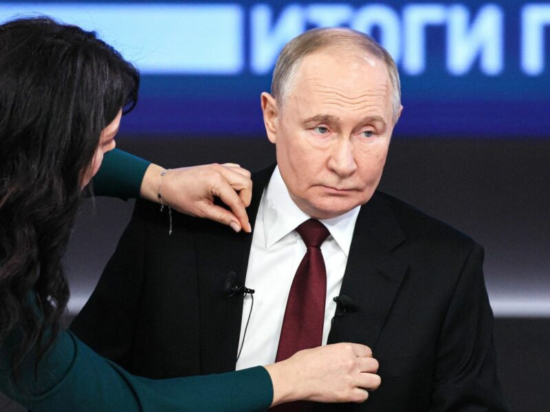 Photo of Russian President Vladimir Putin getting ready to give his end-of-year address in Moscow on Dec. 19