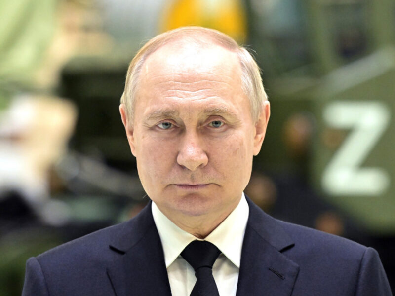 Photo of Russian President Vladimir Putin in January 2023 with a vehicle bearing the letter Z in the background
