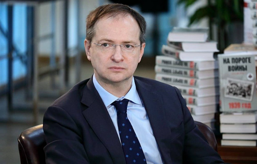 Photo of Russian presidential aide Vladimir Medinsky sitting in front of books