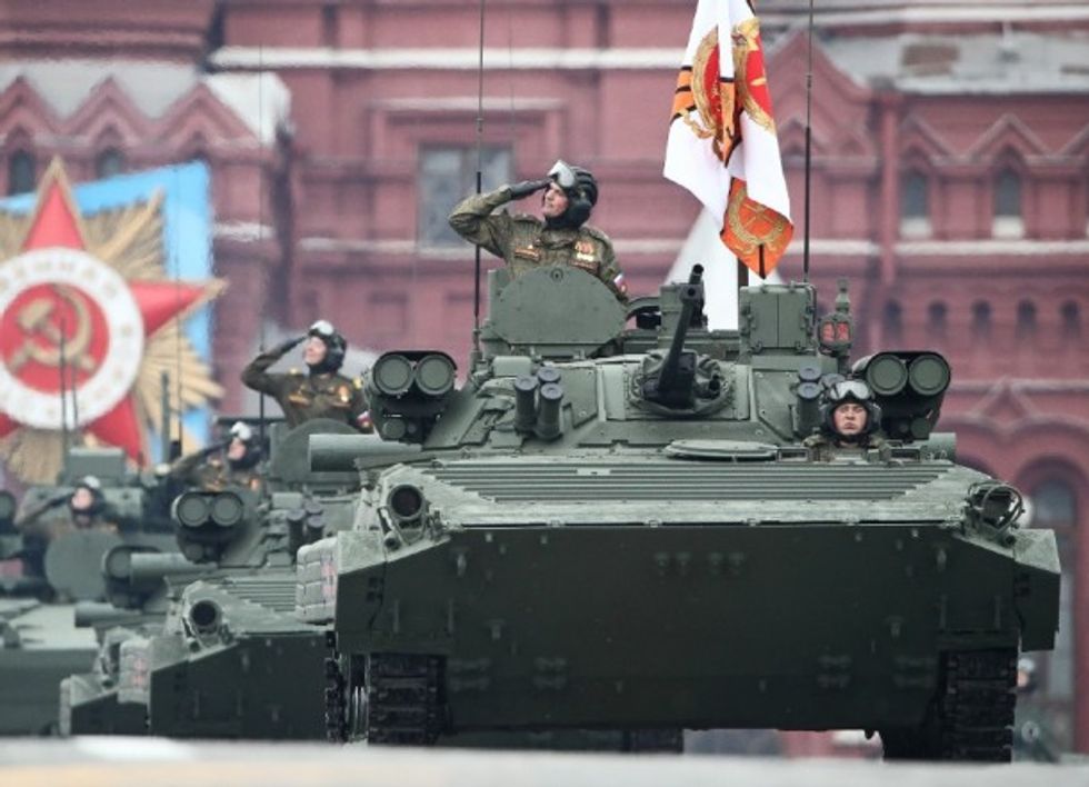 photo of Russian tanks roll down Moscow’s Red Square during a Victory Day military parade on May 9 which marked the 76th anniversary of the victory over Nazi Germany during World War II