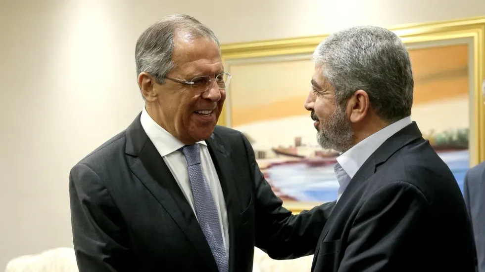 Photo of Russia's Foreign Minister Sergey Lavrov (L) and Khaled Mashal, then leader of the Islamic Palestinian organization Hamas.