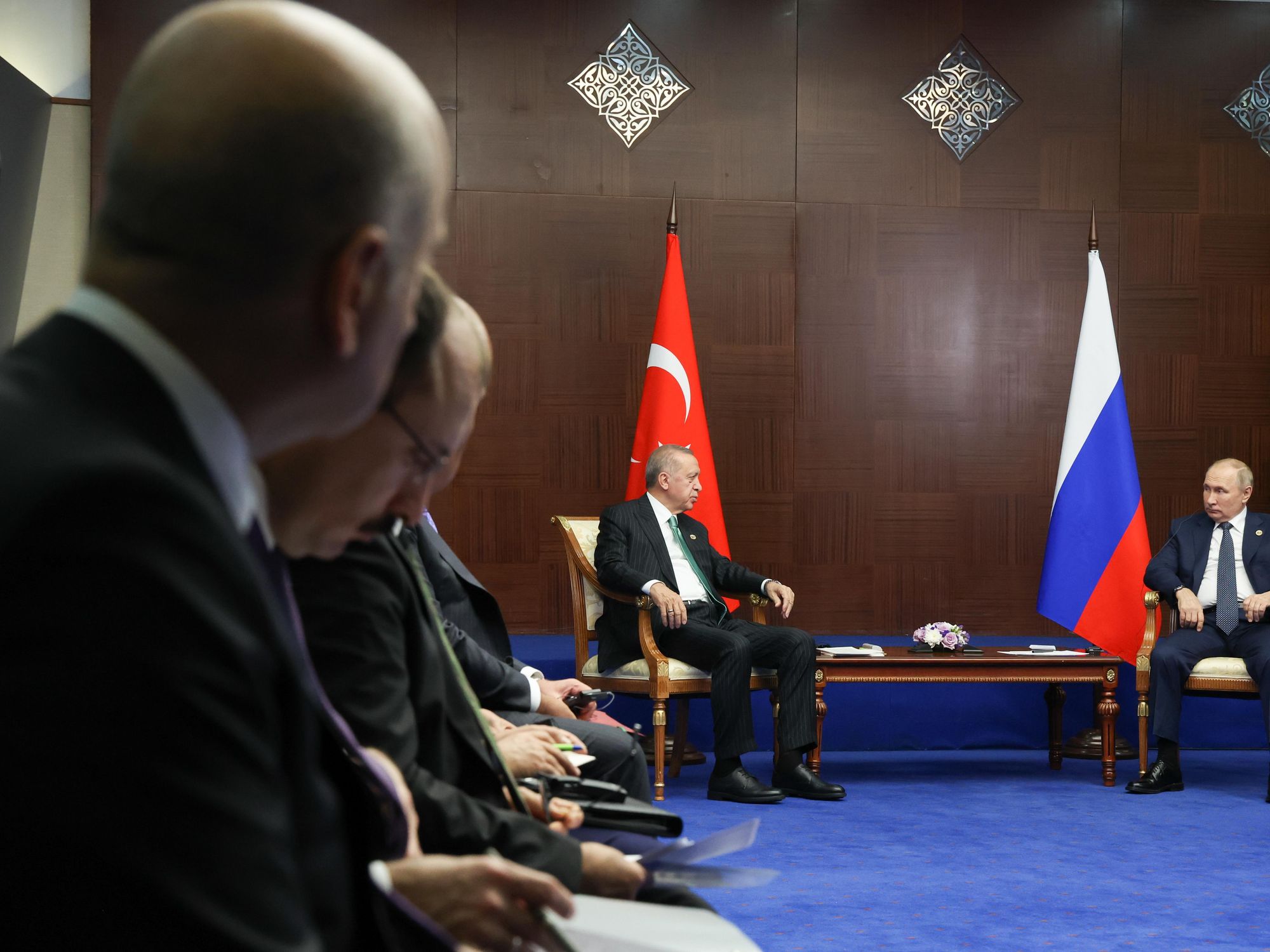Photo of Russia's President Vladimir Putin and Turkey's President Recep Tayyip Erdogan talking during a meeting on the sidelines of the 6th summit of the Conference on Interaction and Confidence-Building Measures in Asia