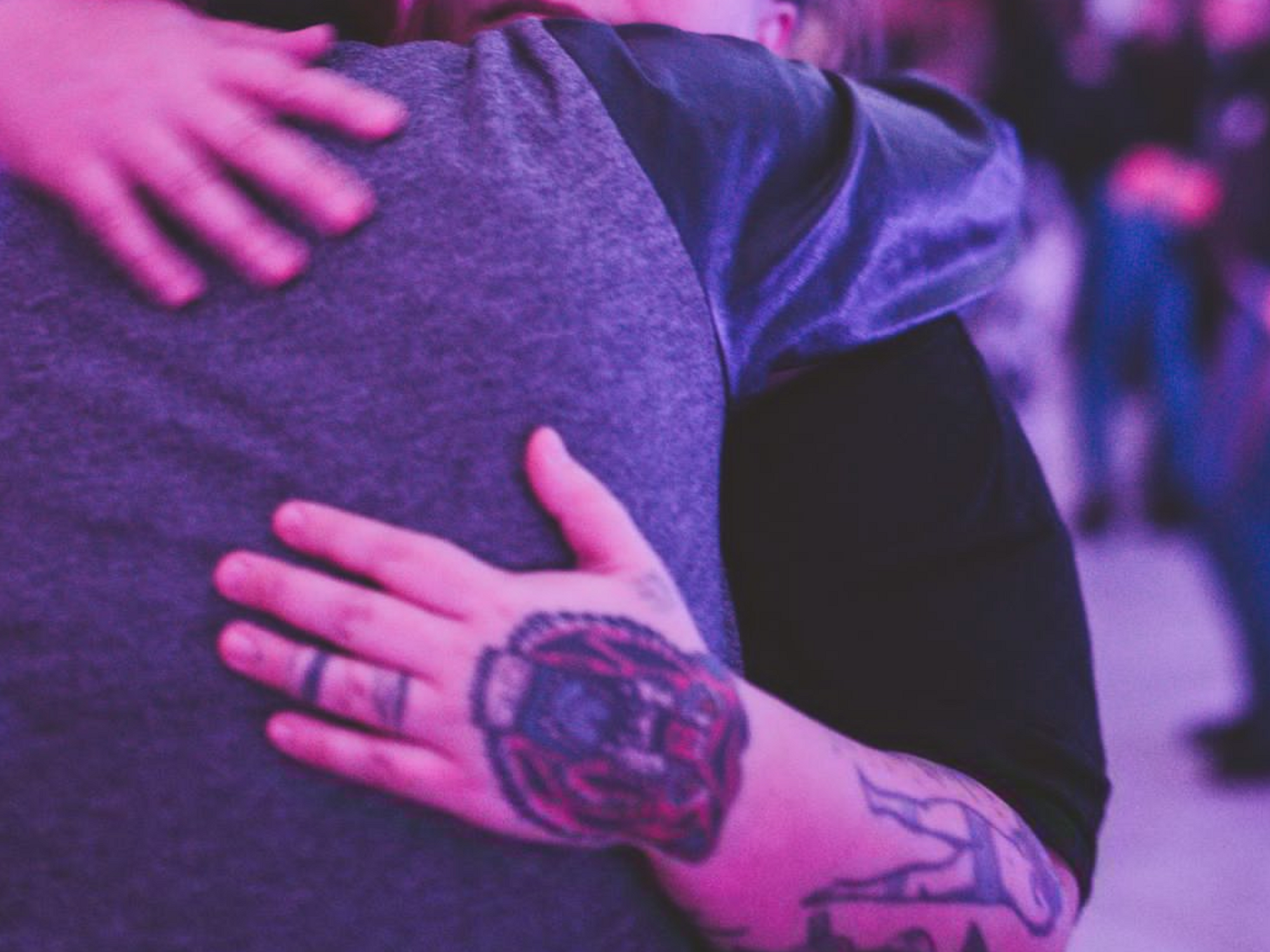 Photo of rwo members of the ​Aborcyjny Dream Team embracing at an event