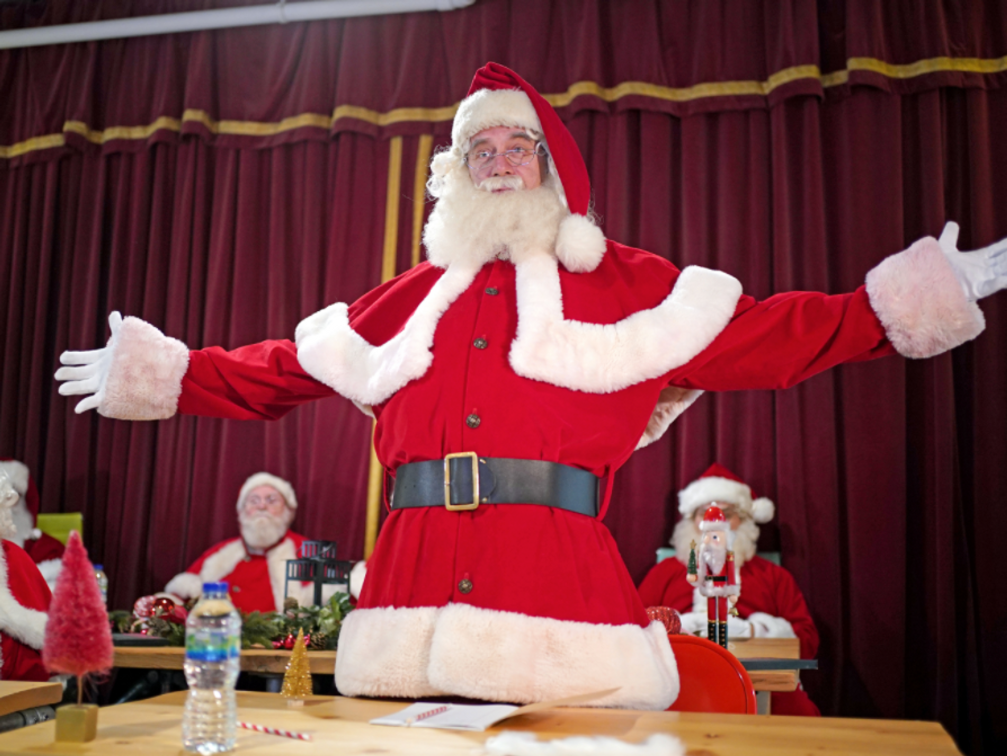Photo of Santas in training at the annual Santa School, held at the Ministry of Fun, an entertainment company in London.