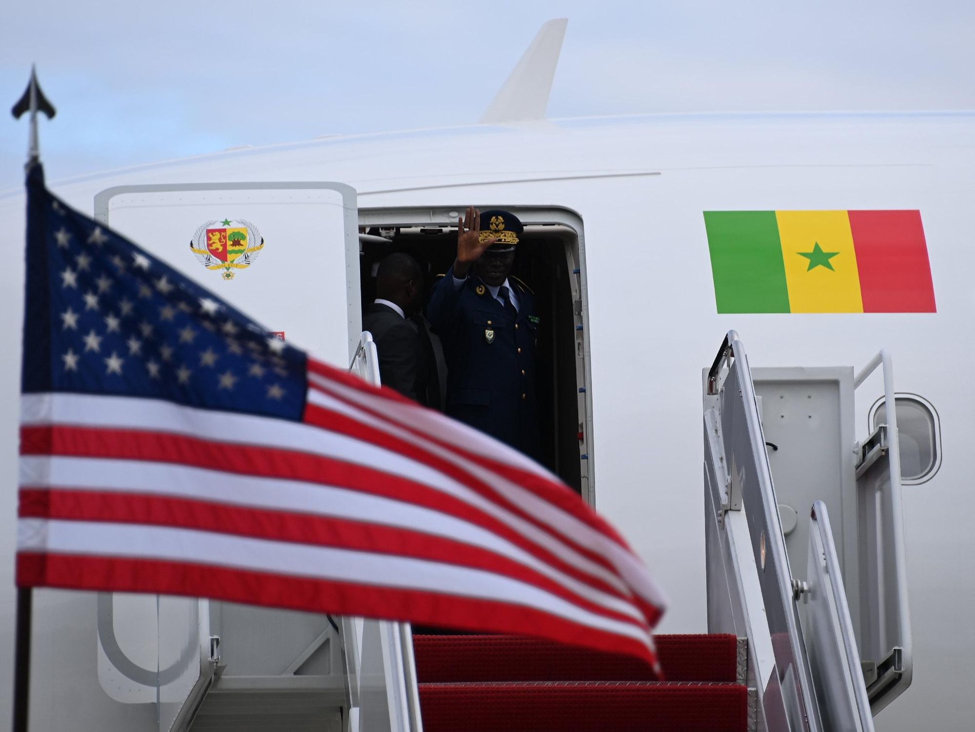 photo of Senegal President Macky Sall coming out of his airplane