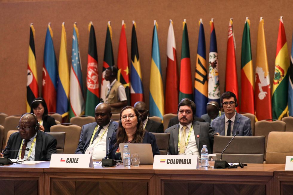 photo of Senior officials from members of the Non-Aligned Movement (NAM) attend a meeting in Kampala, the capital of Uganda,