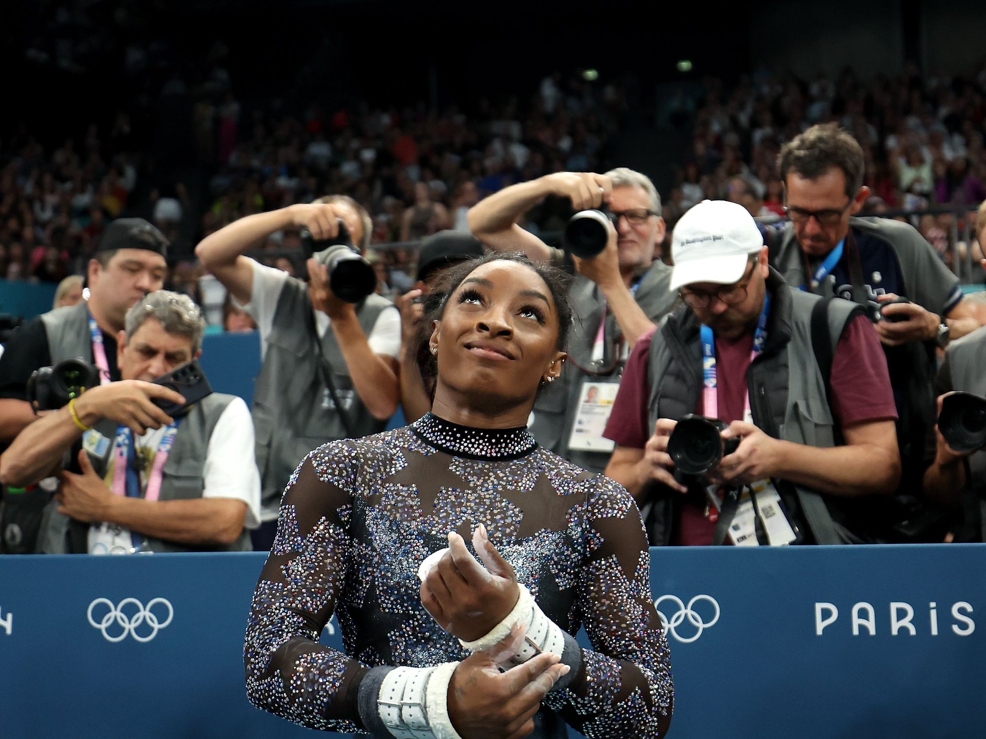 photo of Simon Biles waits for her score