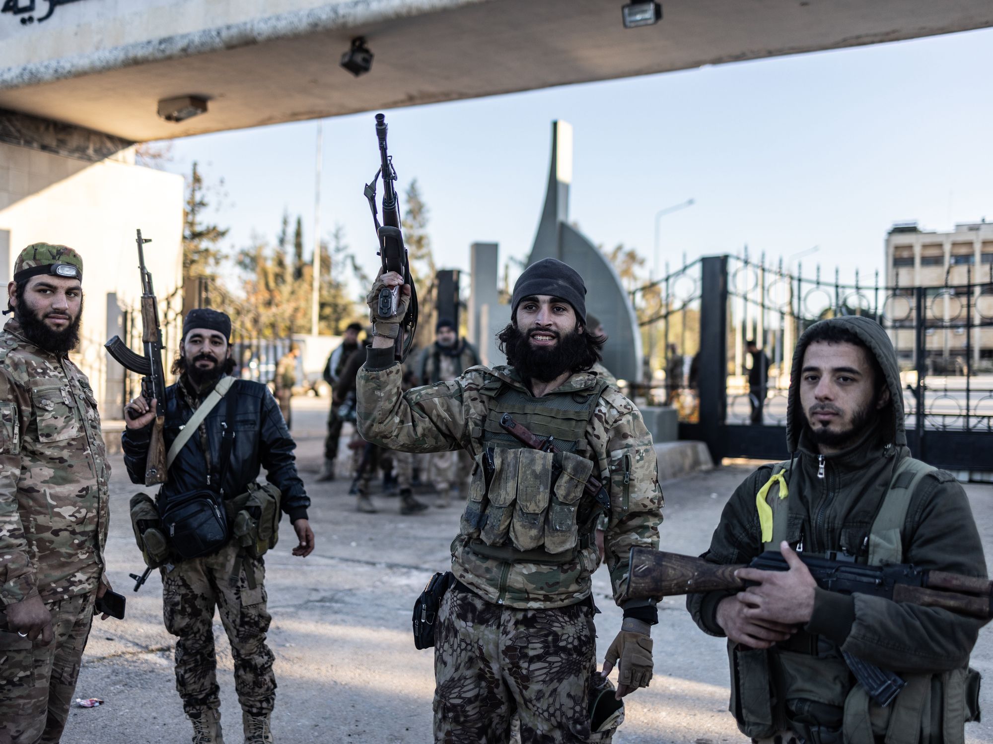 photo of soldiers holding their automatic weapons
