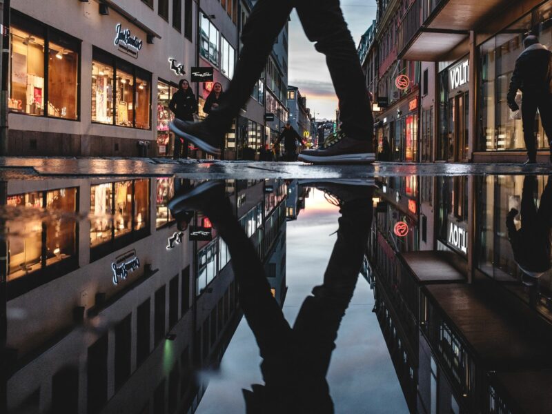 Photo of someone walking through a town in Sweden