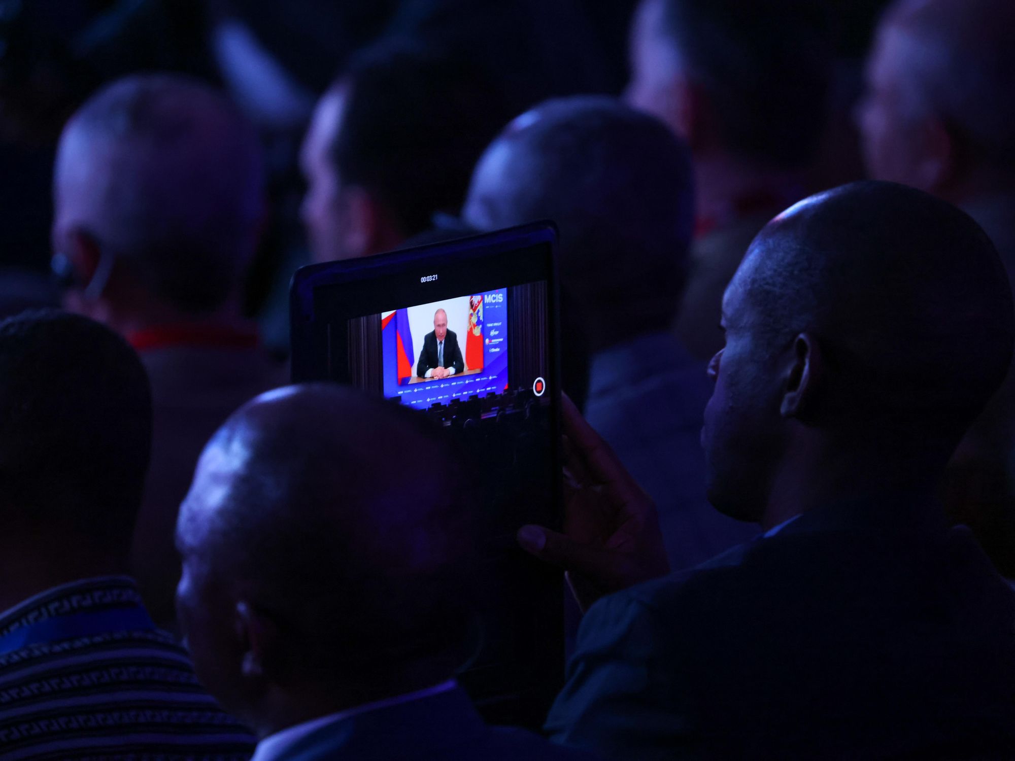 Photo of spectators watching the address by Russia's President Vladimir Putin at the 10th Moscow Conference on International Security