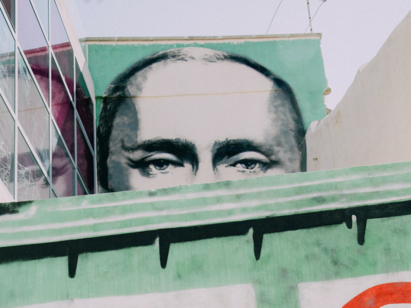 Photo of street art depicting Vladimir Putin in Sicily, Italy