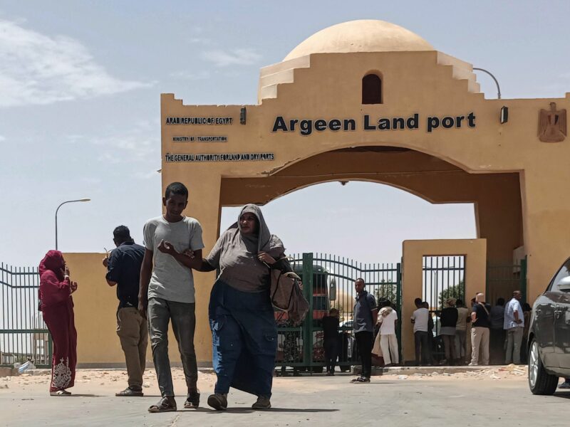 Photo of Sudanese refugees cross into Egypt through the Argeen land port, to escape the conflict in their home country.