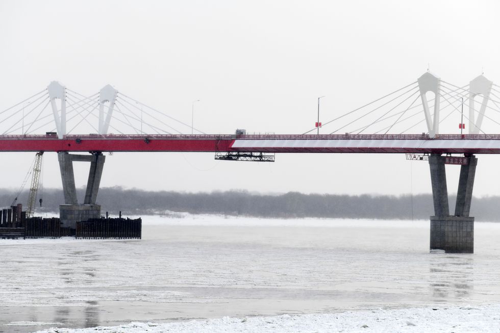 photo of the first highway bridge connecting China and Russia across the Heilongjiang River.