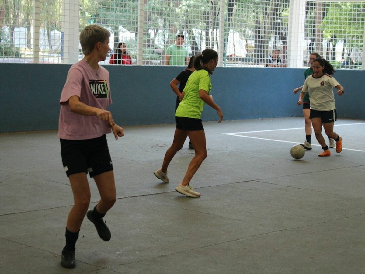 Photo of the "Football, Sweat and Joy" football club playing a match
