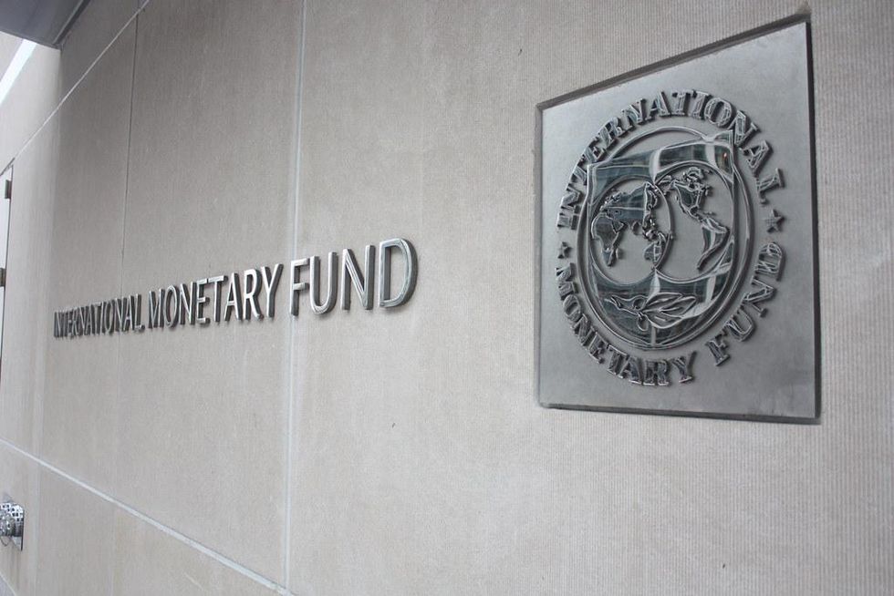 Photo of the IMF sign on the wall of the institution's headquarters