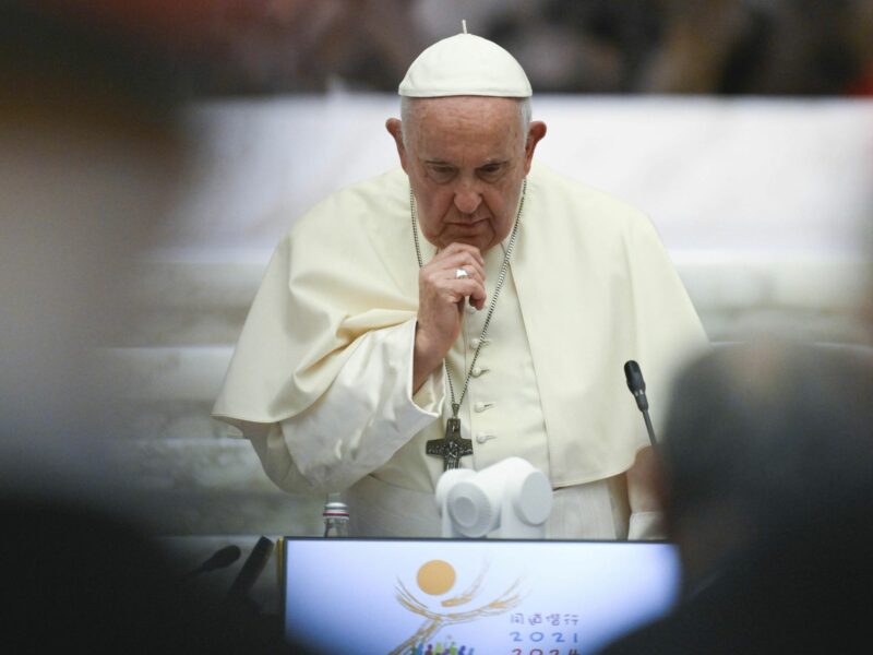 photo of the pope holding his chin