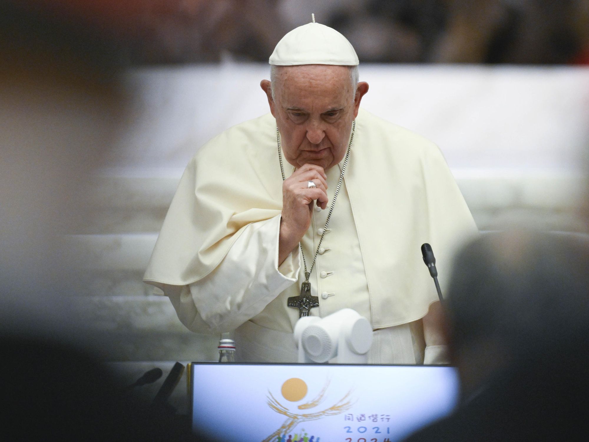 photo of the pope holding his chin