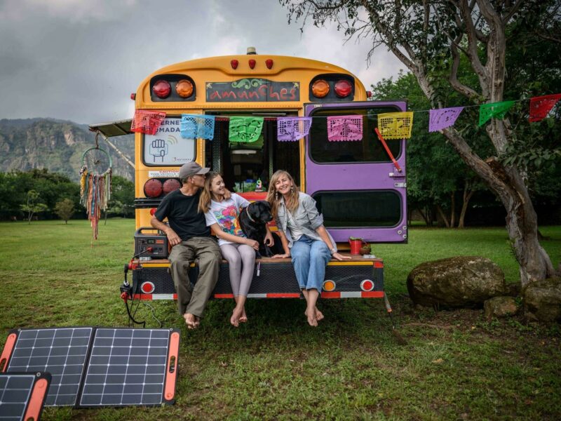 Photo of the traveling family sitting on the back of the minibus in Tepoztlan, Mexico