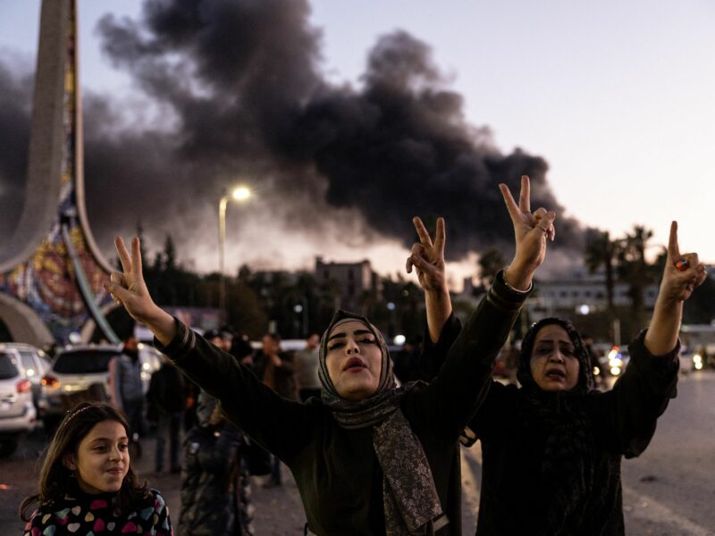 Photo of three generations of women celebrating after Assad's fall