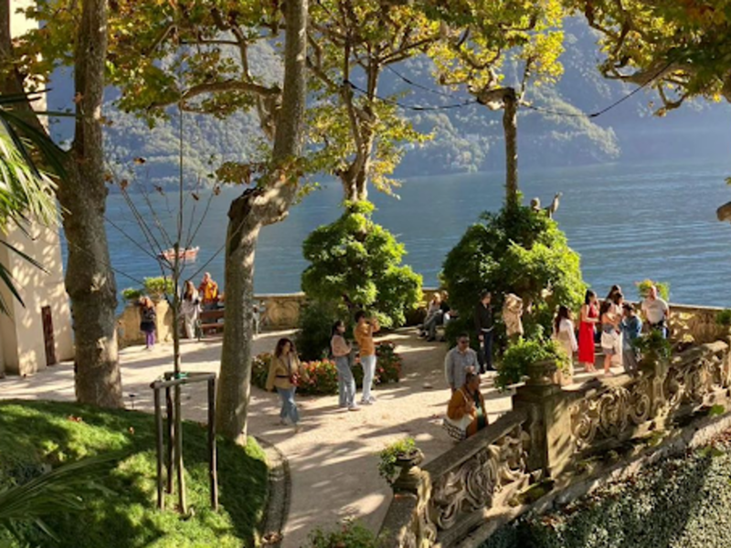 photo of tourists in lake Como