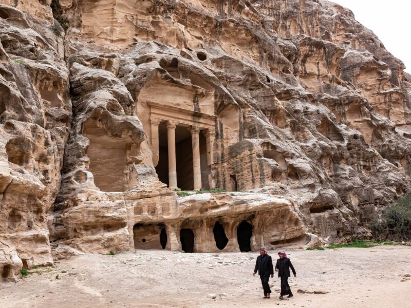 Photo of tourists walking in Petra, Jordan.