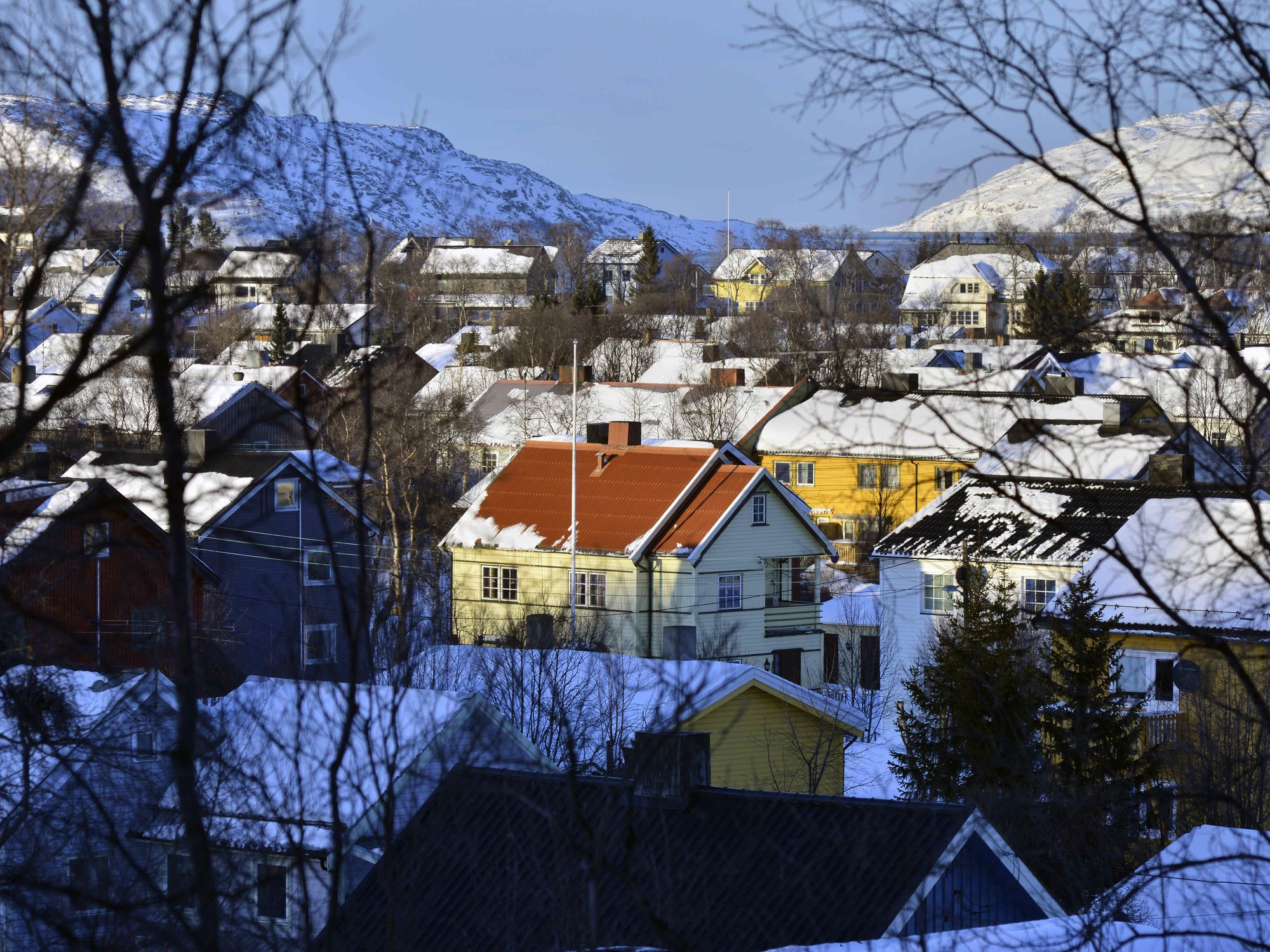photo of town of kirkenes norway covered in snow
