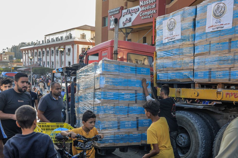 Photo of trucks loaded with clean water