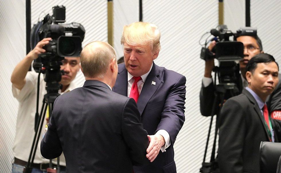 photo of trump and putin with putin's back
