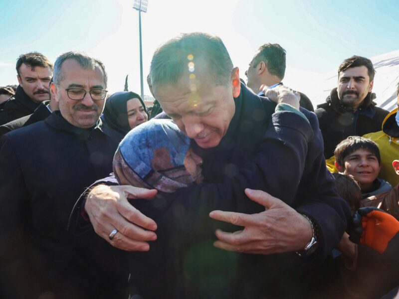 Photo of Turkish President Recep Tayyip Erdoğan consoles families as rescue workers inspect the earthquake-hit areas in Turkey.