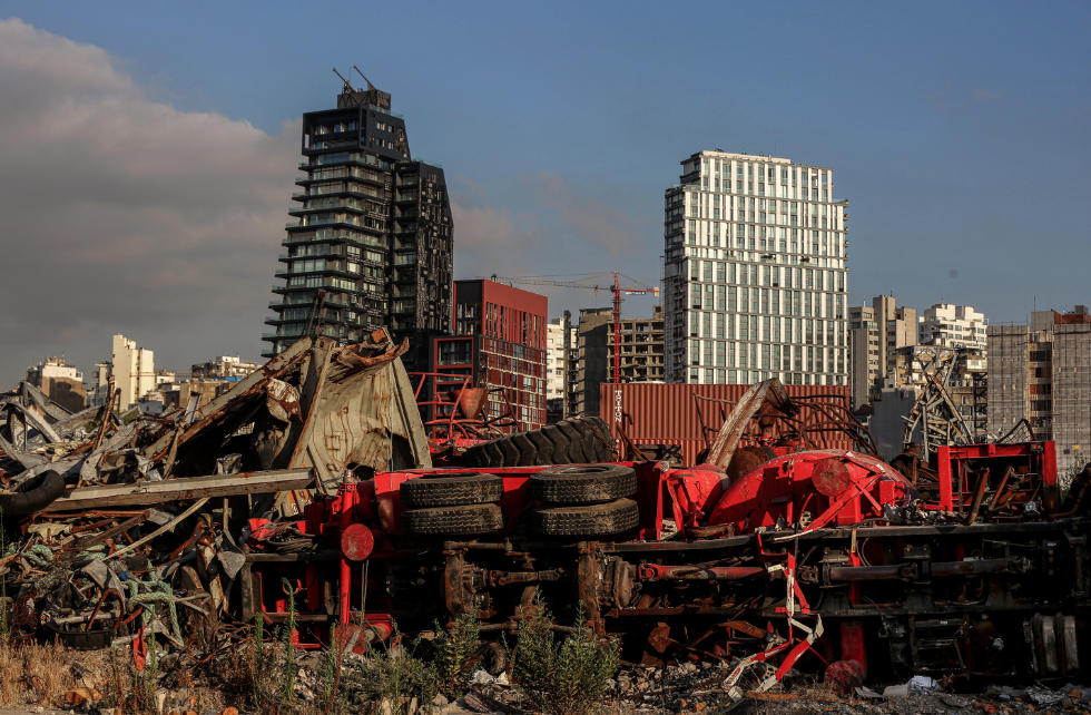 Photo of twisted iron structures still visible in Beirut's port, pictures three years after the deadly explosion