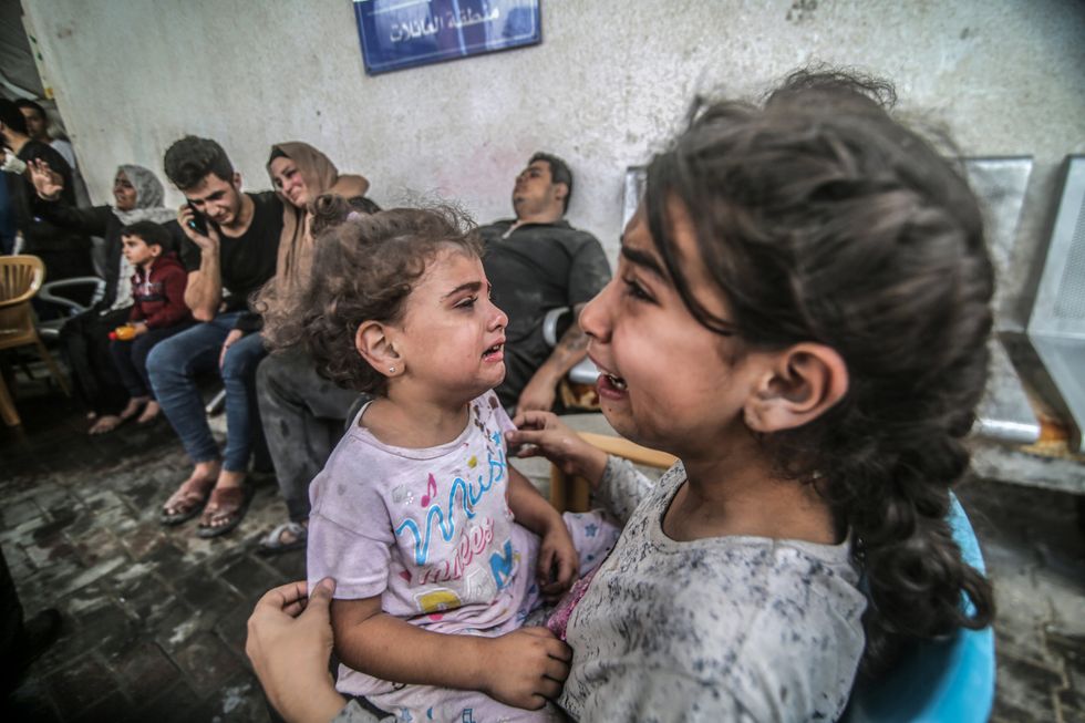 photo of two children crying