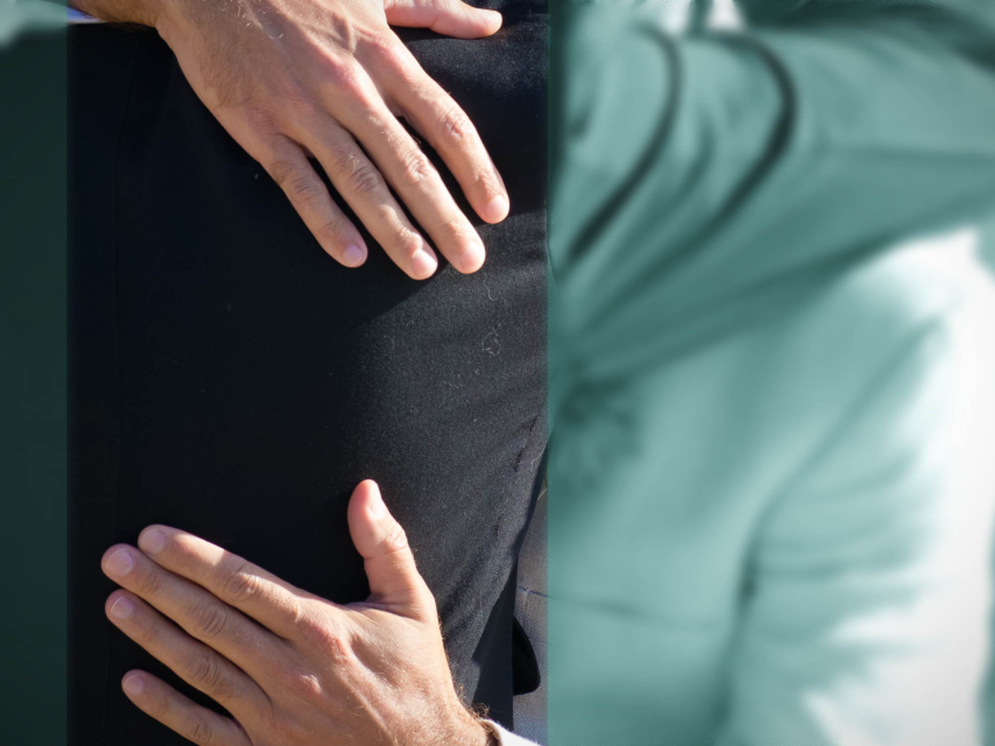 Photo of two men embracing in a hug