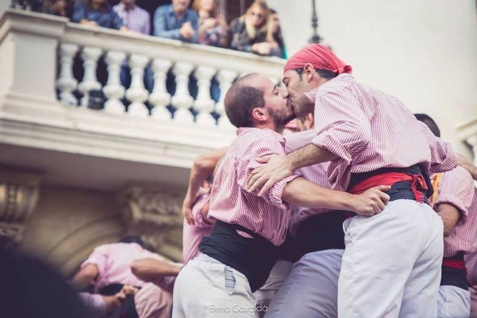 Photo of two people kissing during Agrogay