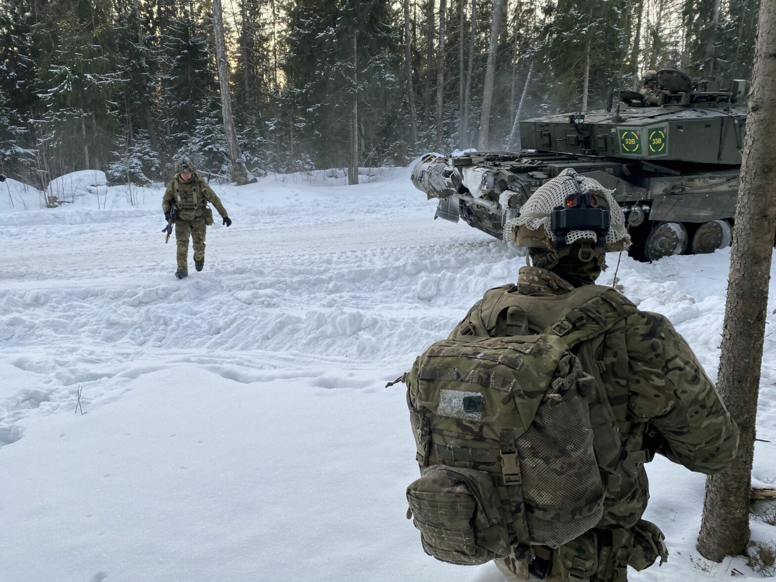 photo of two soldiers in the snow