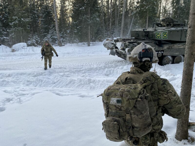 photo of two soldiers in the snow