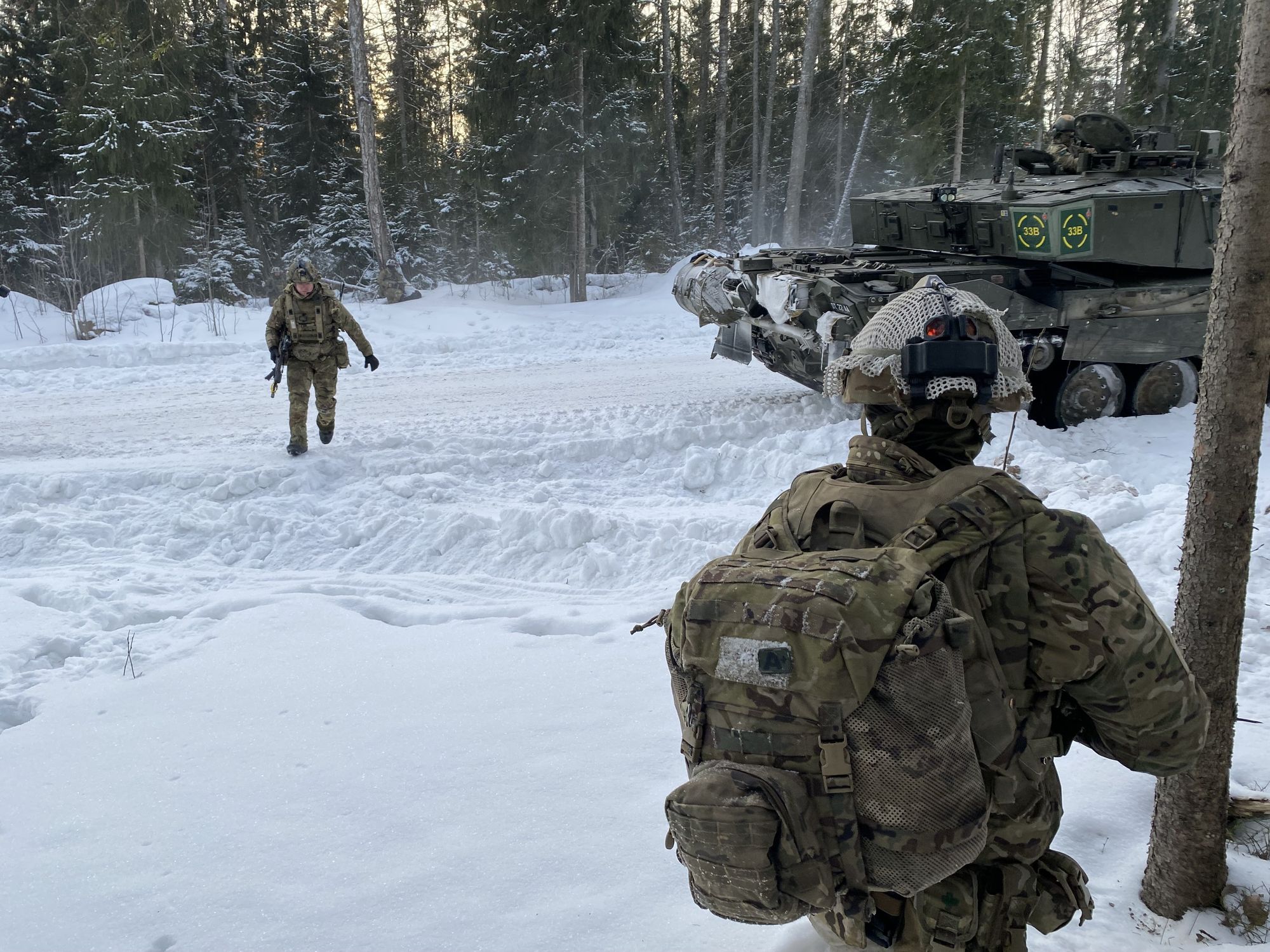 photo of two soldiers in the snow