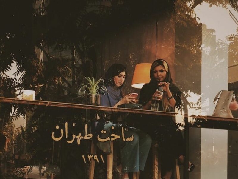 Photo of two women in a cafe in Tehran, Iran.