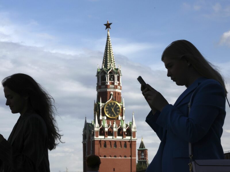 photo of two women in shadows of Red Square in Moscow