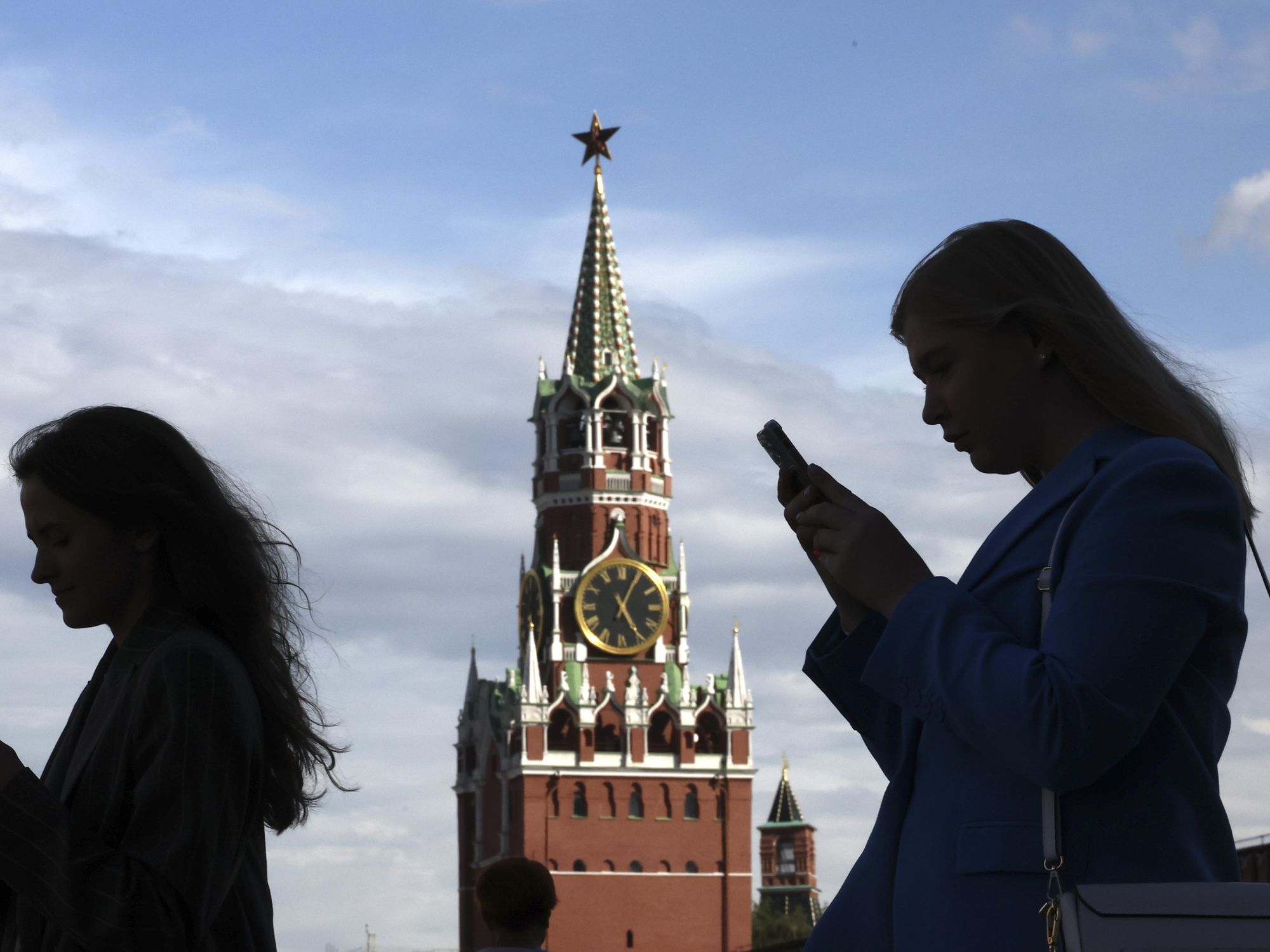 photo of two women in shadows of Red Square in Moscow